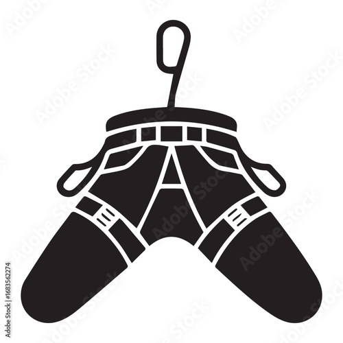 Climbing harness for rock climbing or mountaineering, hanging from a carabiner, isolated on white background technology background