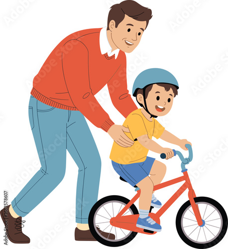 Father teaching son to ride a bicycle with a helmet