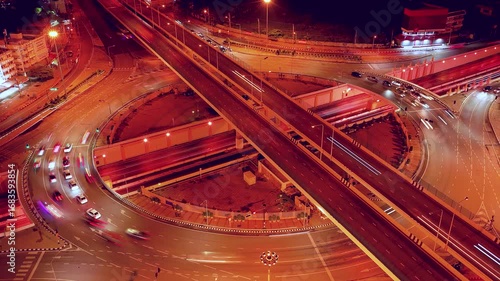 Expressway, Self-driving autonomous electric cars of the future with elements move along a busy traffic intersection. Artificial Intelligence, Car Scan, GPS Tracking, Smart Roads, IoT, highway
