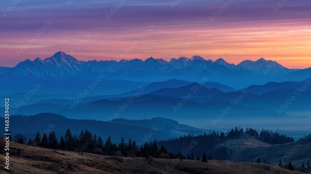 Obraz premium Majestic mountain range sunrise panorama