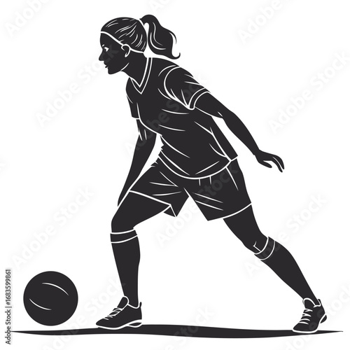 Woman soccer player dribbling ball on field football