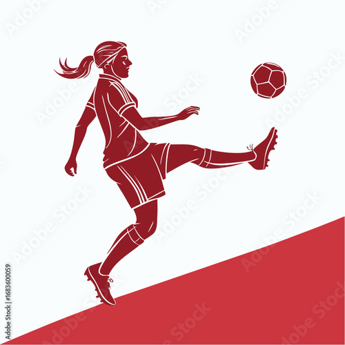 Woman soccer player kicking ball in mid-air football