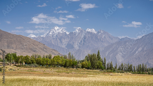 Scenic landscape view of mighty Hindu Kush mountain range at Ishkashim, Wakhan Corridor, Gorno-Badakhshan, Tajikistan Pamir	