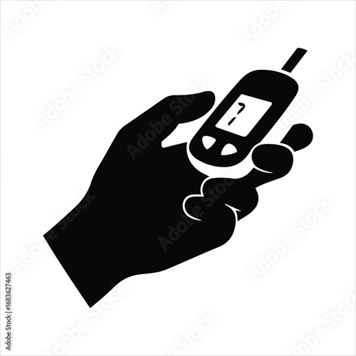 Hand holding glucometer device for diabetes blood sugar testing health monitoring healthcare concept