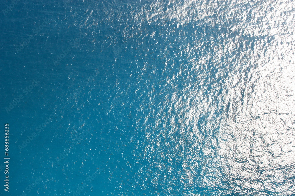 Fototapeta premium Sunlight Reflections on Bright Blue Ocean Water