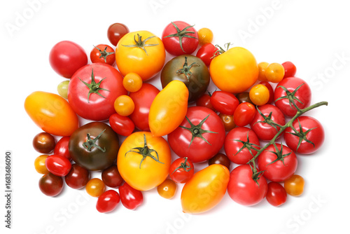 Wallpaper Mural Heap of different ripe juicy tomatoes isolated on white, top view Torontodigital.ca