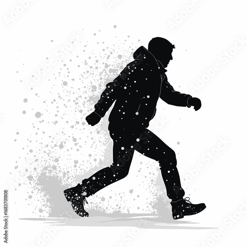 Black silhouette of man walking in snow during winter season  