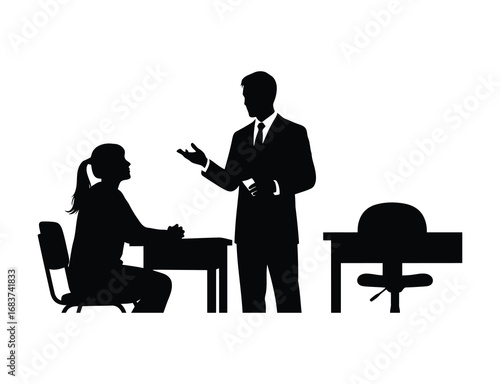 Silhouette of a teacher explaining something to a student in the classroom