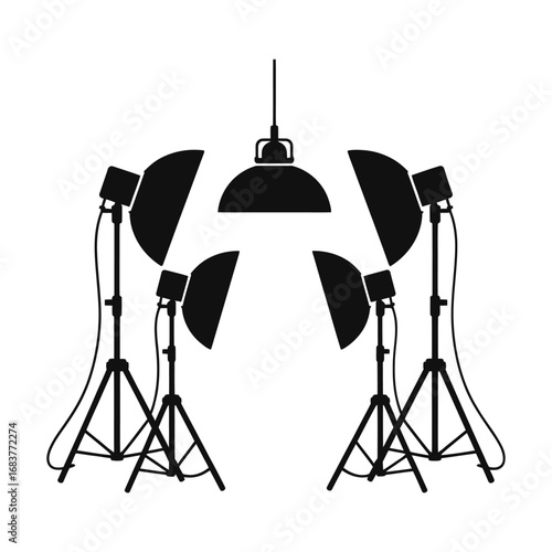 Studio lighting setup with softboxes and overhead lamp
