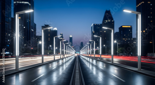 Modern City Street at Night with LED Street Lights and Car Light Trails