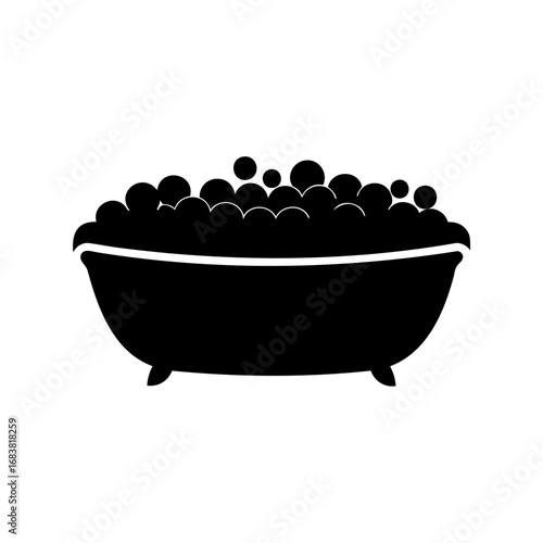 Black and white silhouette of a bubble bath in a vintage tub