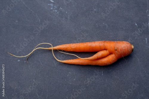Carrot with two offshoots.