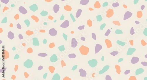 Seamless terrazzo pattern with scattered colorful abstract shapes in pastel shades of purple, mint green, and peach on a light cream background