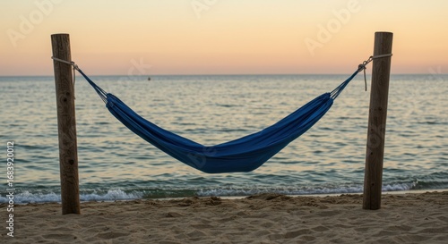 Blue Hammock on Sandy Beach at Sunset
