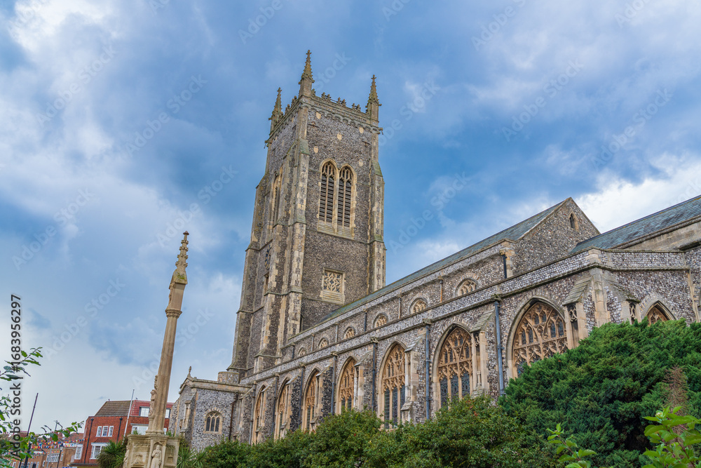 Obraz premium Cromer Church of St Peter and Paul, a 15th century flint built religious place of worship building with bell tower