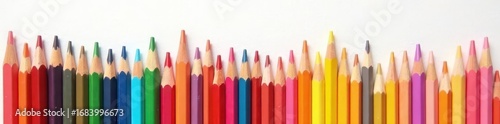 Array of vibrant colored pencils arranged neatly against a stark white background , colored pencils, isolated, saturation