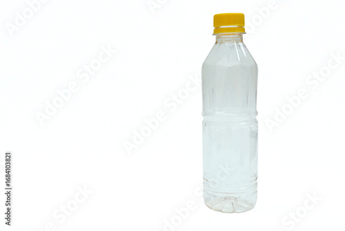 Foto Empty plastic mineral water bottle on white background