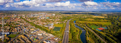 Aerial panoramic view of Slough town centre with modern buildings and green areas