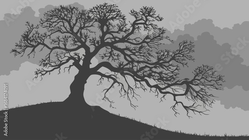 A Majestic Tree Silhouette Against a Cloudy Sky.