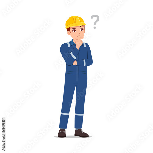 A thoughtful worker in uniform and helmet thinking about question with hand on chin