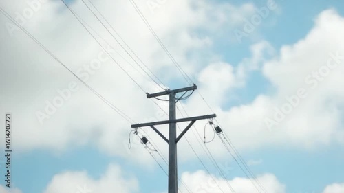 clouds fly over the electric pole