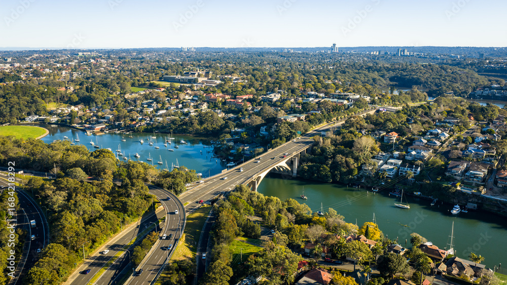 Fototapeta premium Panoramic view of western sydney and Gladesville Bridge over the Parramatta River.