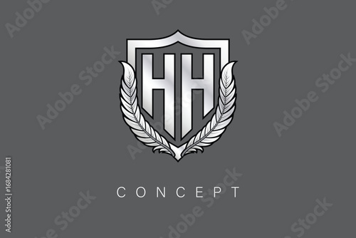 HH Creative Initial Letter Logo with Shield and Laurel Wreath Silver Metallic Branding Emblem on Gray Background.