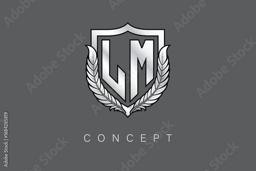 LM Creative Initial Letter Logo with Shield and Laurel Wreath Silver Metallic Branding Emblem on Gray Background.