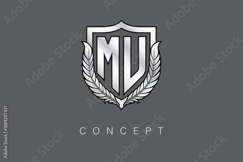 MU Creative Initial Letter Logo with Shield and Laurel Wreath Silver Metallic Branding Emblem on Gray Background.