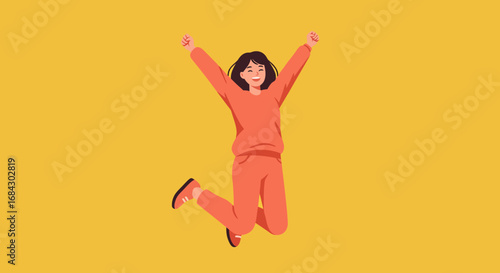 Joyful Woman Jumping in Orange Outfit.