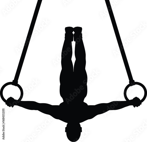 Gymnast performing on rings gymnastics sport