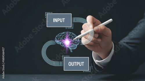 Businessman activating brain's input/output concept with digital pen on screen