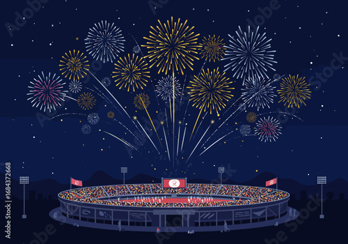 Stadium filled with people under a fireworks display at night