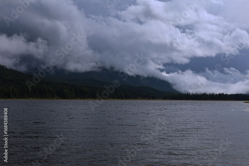 A Mysterious Lake Located Beneath Dark and Ominous Clouds