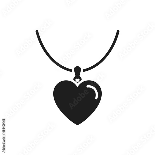 Elegant heart pendant necklace suspended gracefully in a minimalist composition that exudes beauty
