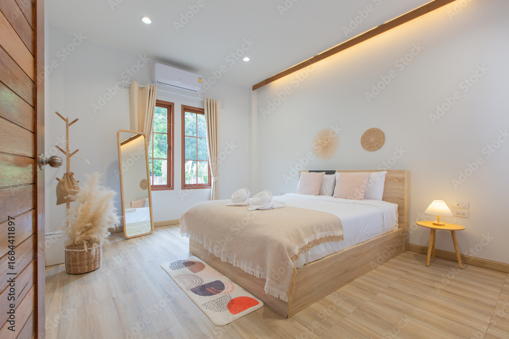 Fototapeta premium bedroom with queen-sized beds, contemporary decor