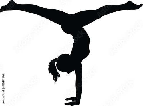Gymnastic silhouette of a woman performing a handstand