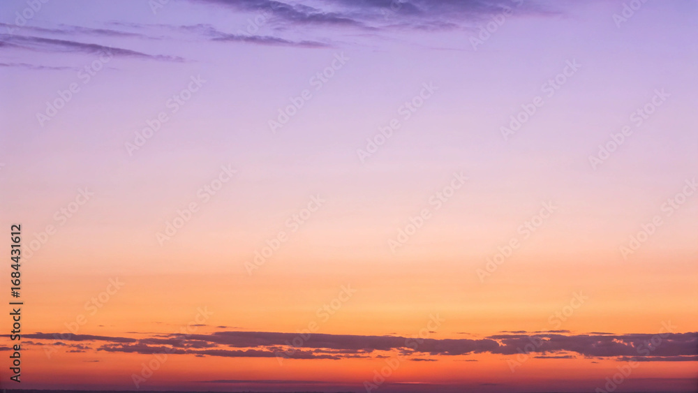 Fototapeta premium Soft Gradient Sky with Pastel Hues of Purple, Pink, and Orange at Sunset twilight