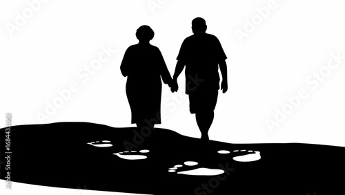 Silhouette of elderly couple holding hands walking with footprints on the ground in black and white style