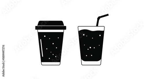 a cup and glass filled with dark liquid and bubbles