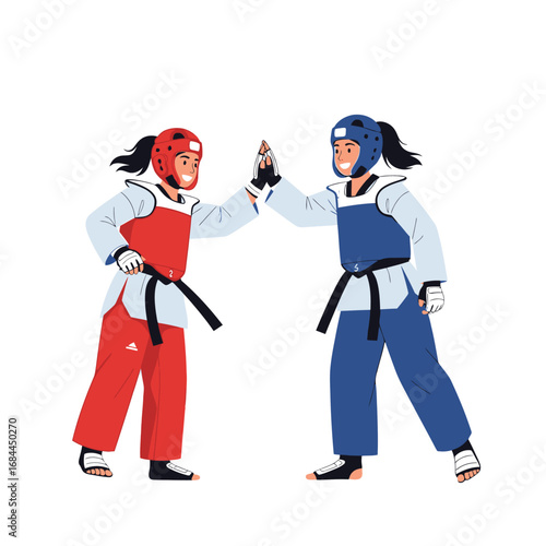 Two female taekwondo athletes giving a high five, demonstrating sportsmanship and camaraderie.