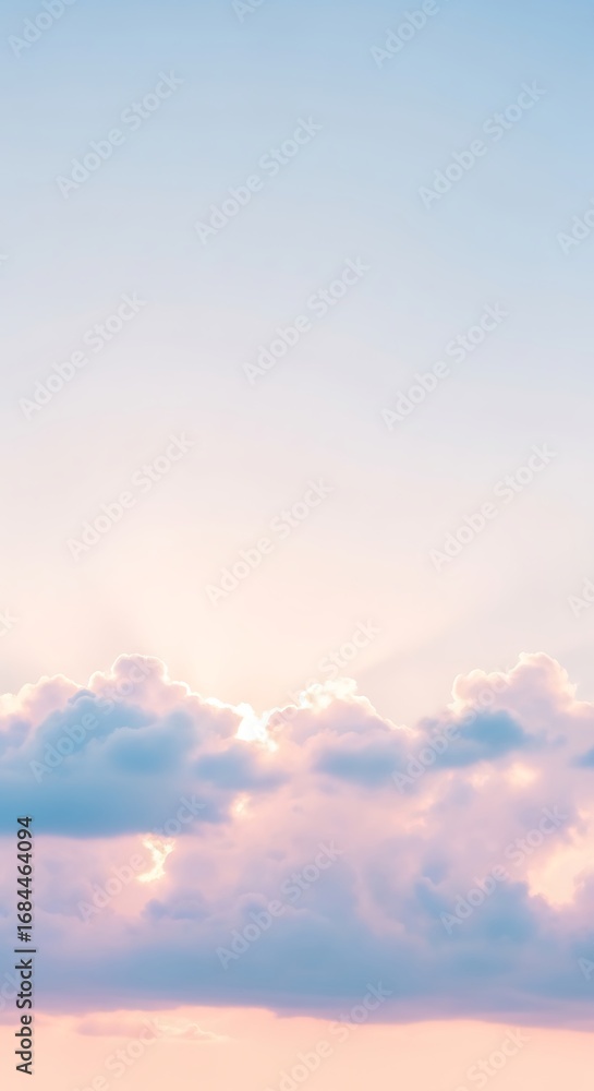 Obraz premium Pastel sky dreams: Gentle hues blending across cloudscape create a tranquil and ethereal ambiance