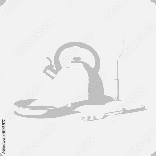 Monochromatic kitchen scene of kettle, pan and spatula conveying simplicity and elegance