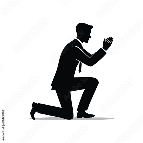Businessman Kneeling in Prayer, Silhouette