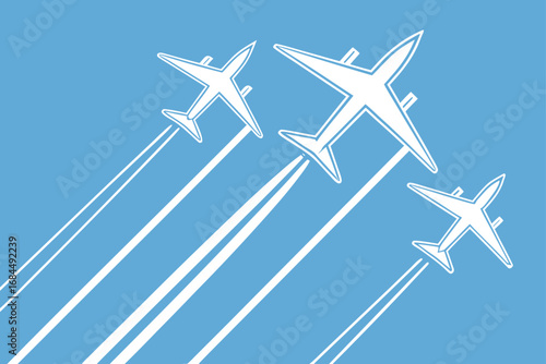 Three white airplanes flying with white contrails on a blue sky background aircraft flight
