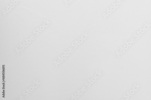 Calm simple white background with soft texture. light gray material looks like clean plaster wall for minimalist house providing feeling of tranquility