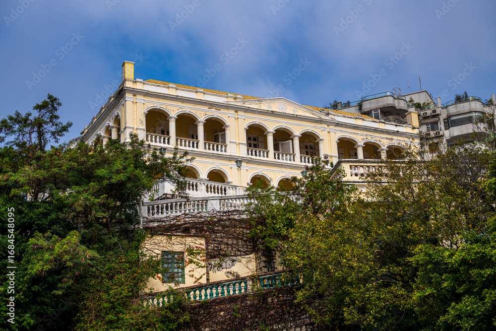 Fototapeta premium Residential buildings and a historical Portuguese building in Macau