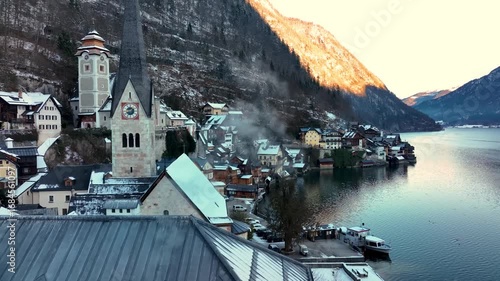Aerial view of the iconic village of Hallstatt in witer at sunrise.