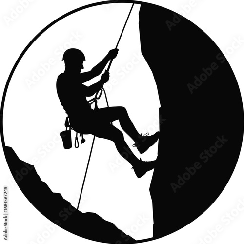 Fearless climber descends rocky mountain silhouette