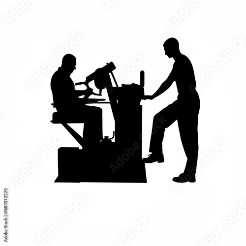Machinist operating cnc lathe with foot pedal silhouette
